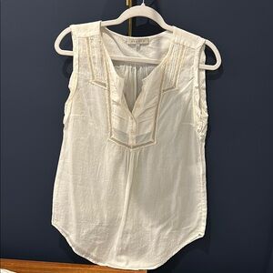 Sandro White Sleeveless Blouse with Bib Collar and Flowing Fit